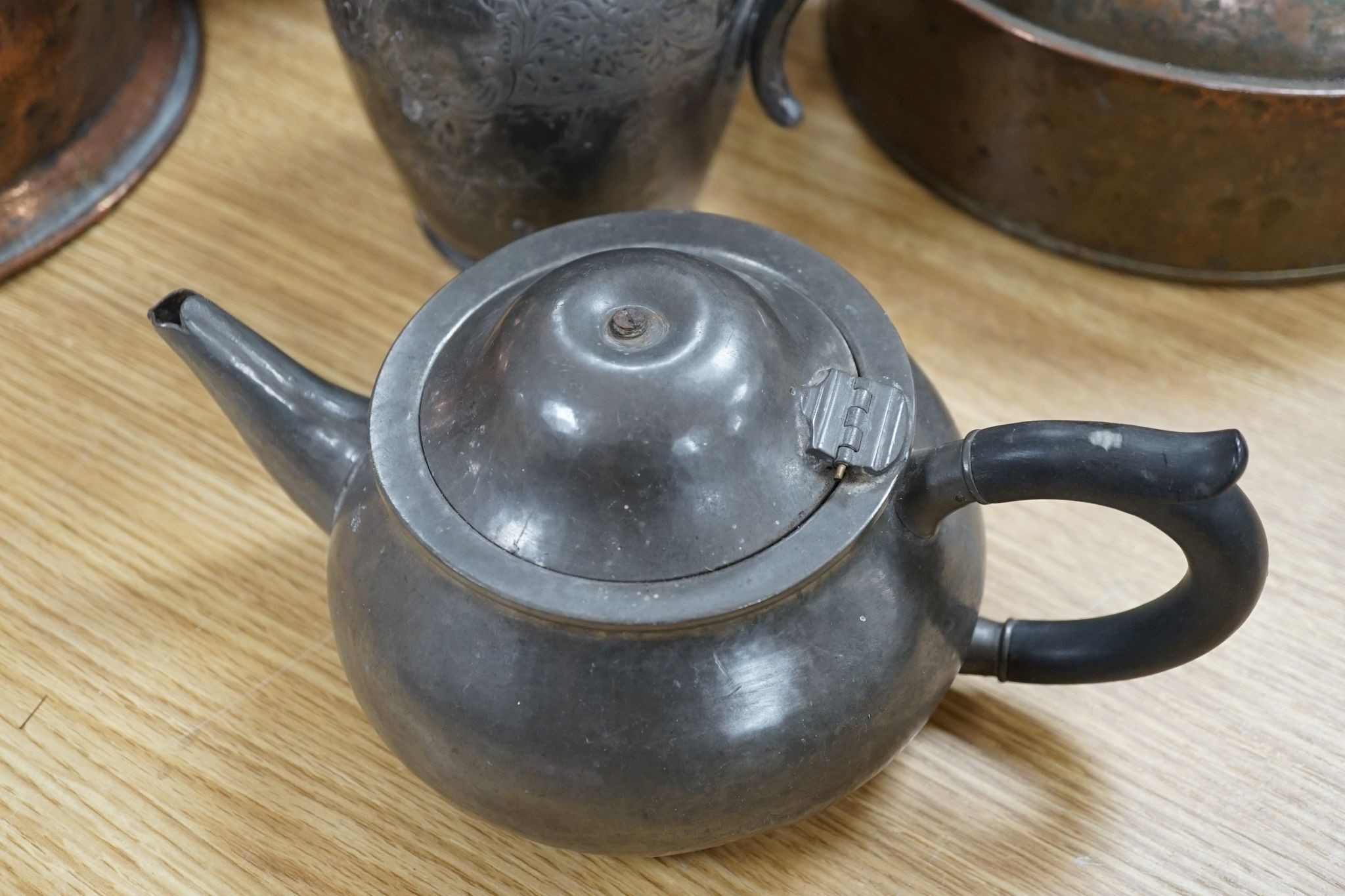 A Copper love token kettle, Georgian copper haystack measure, liberty & Co pewter teapot and a decorative papier mache bucket.